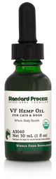 Image of a bottle of liquid VF Hemp Oil from Standard Process Veterinary Formulas next to a dropper that is included with the bottle.